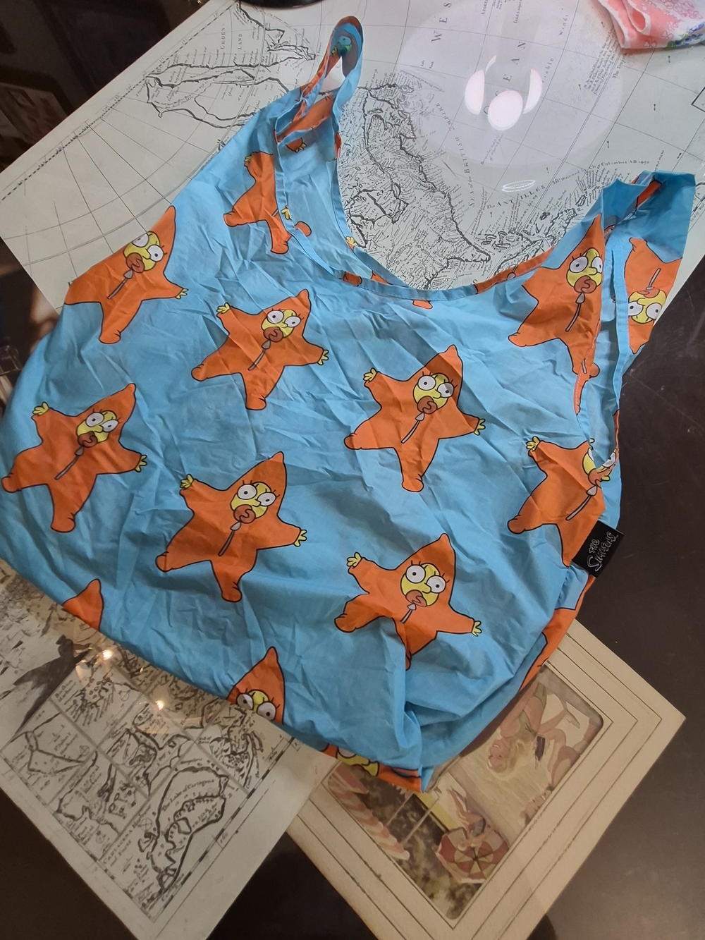 BAGGU Reusable Tote Bag in Bright Blue with Orange Star Characters